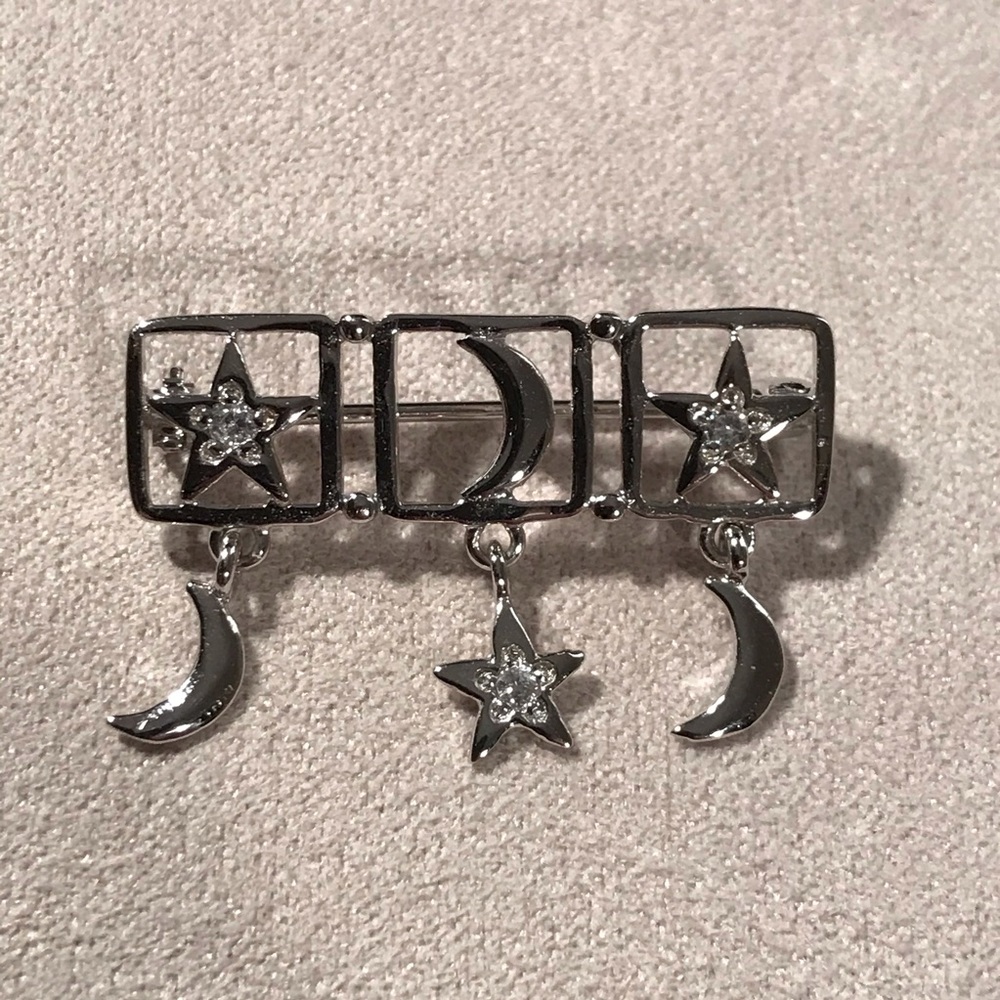 Three  1/4 moons, three stars,not in a row.